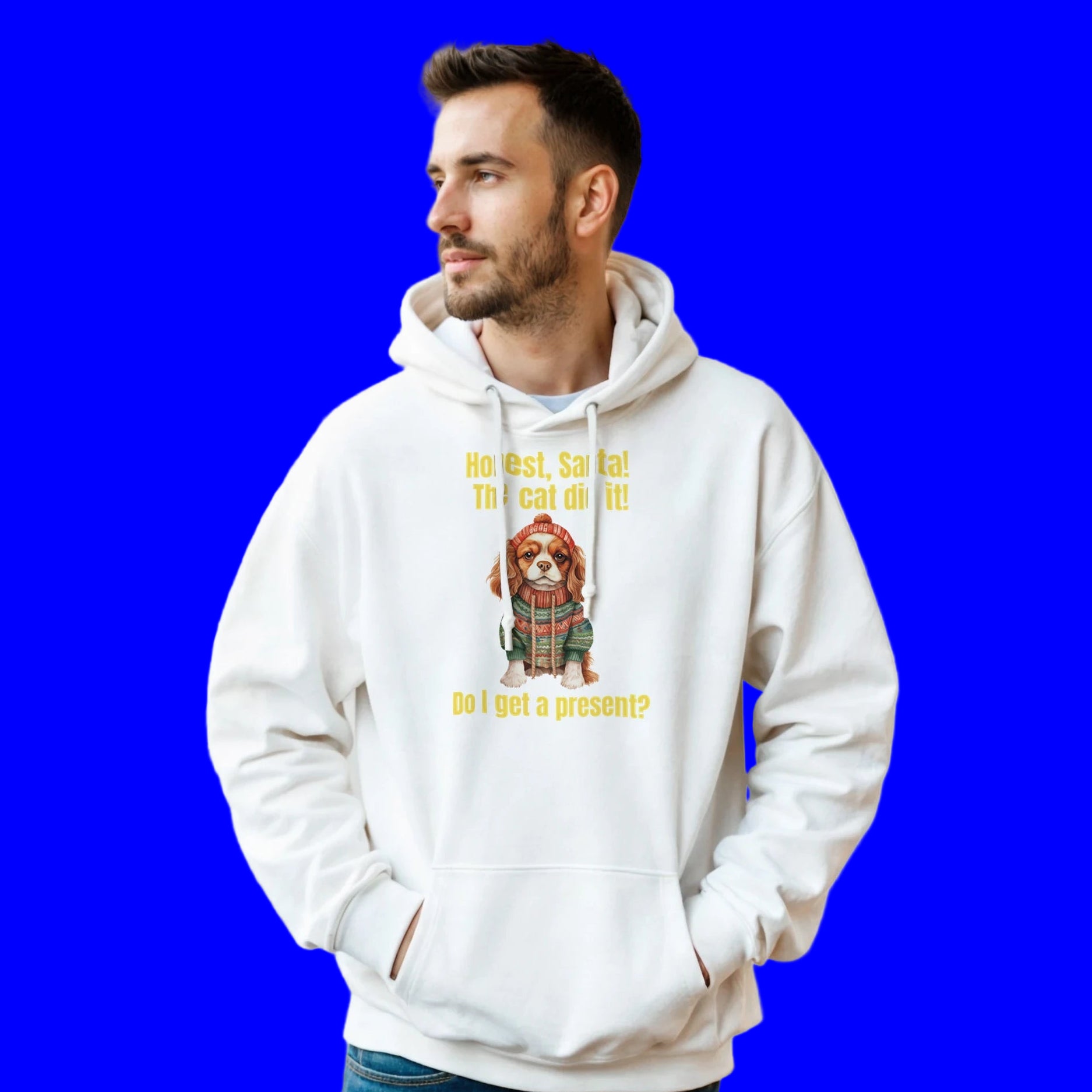 Man wearing a white hoodie with a graphic and text, standing indoors.